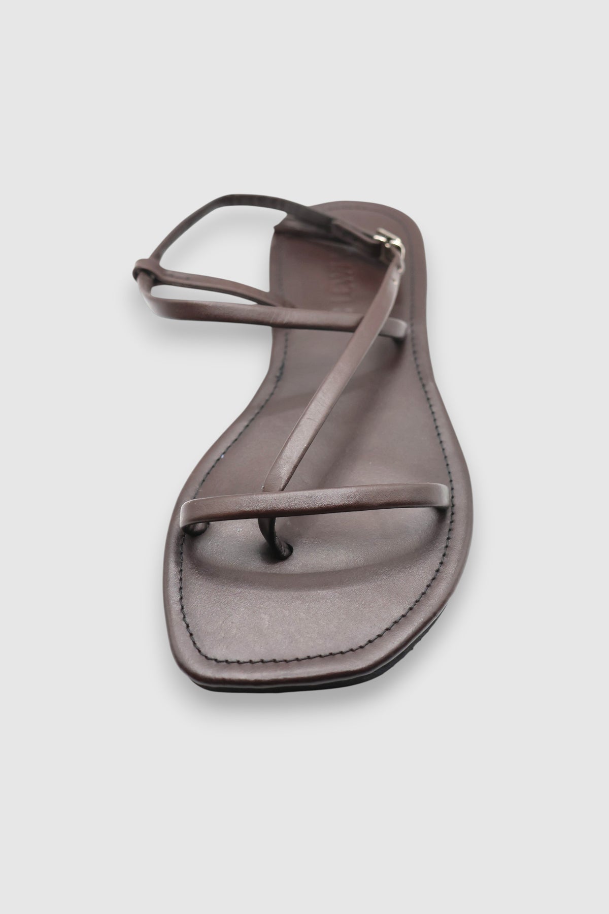 LEWIJE Bentota leather sandal in espresso brown, single sandal in three-quarter view showing the toe loop and ankle strap