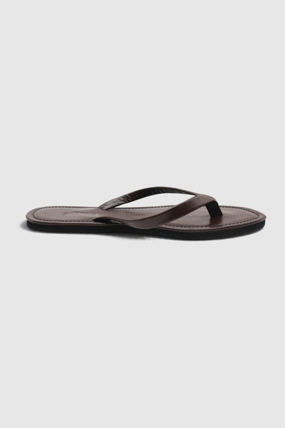 LEWIJE Mirissa flip flop in espresso brown, side profile showing the slim thong strap and black sole