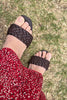 Short video of the Lorne woven slide being worn outdoors, close up on the weave