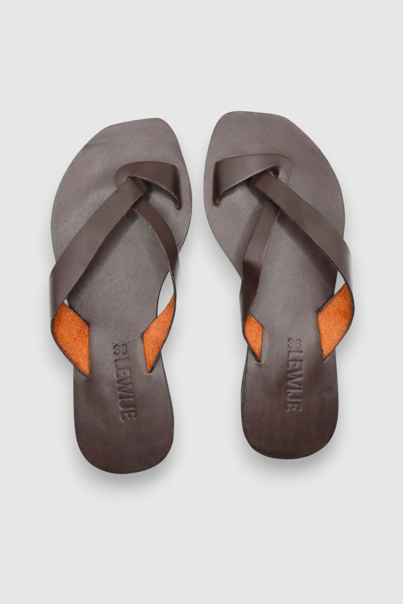 LEWIJE Unawatuna leather flip flop in espresso brown, pair from above showing the crossing straps and debossed LEWIJE footbeds