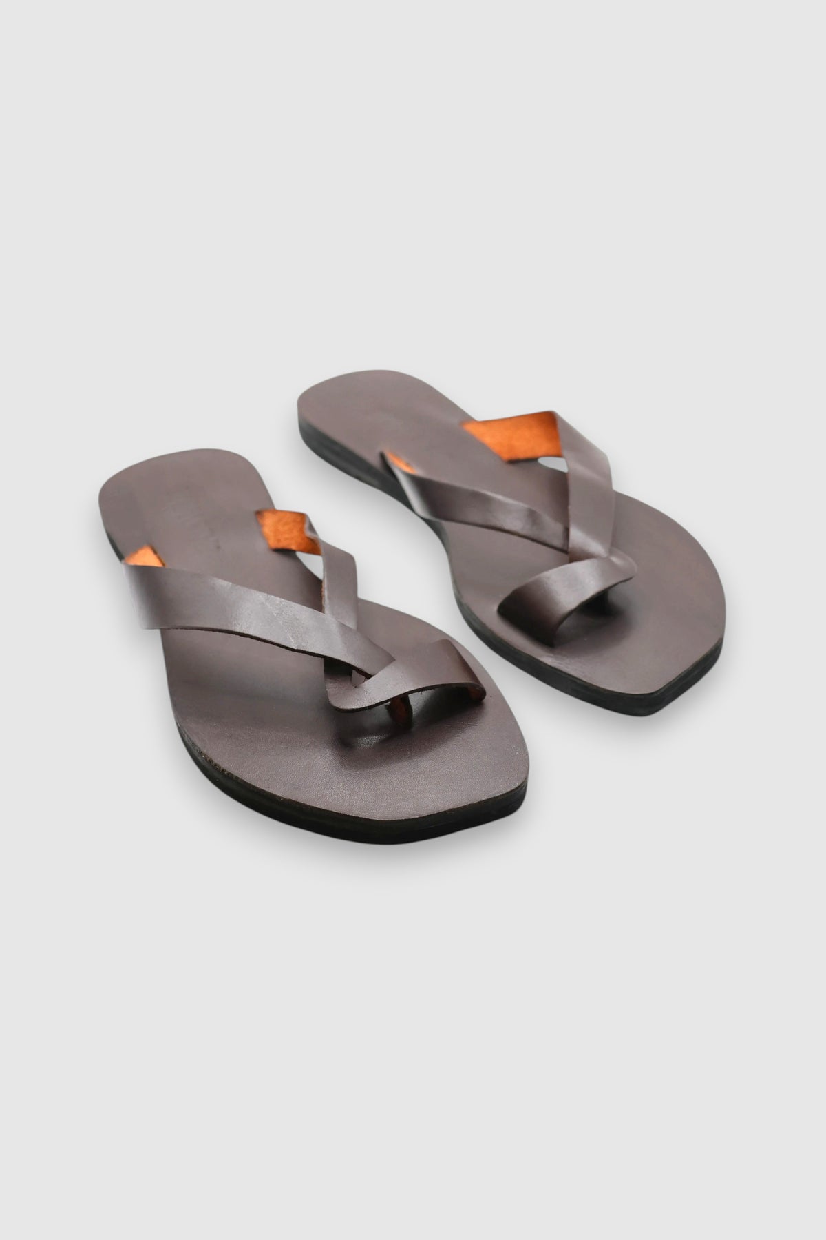 LEWIJE Unawatuna leather flip flop in espresso brown, pair in three-quarter view